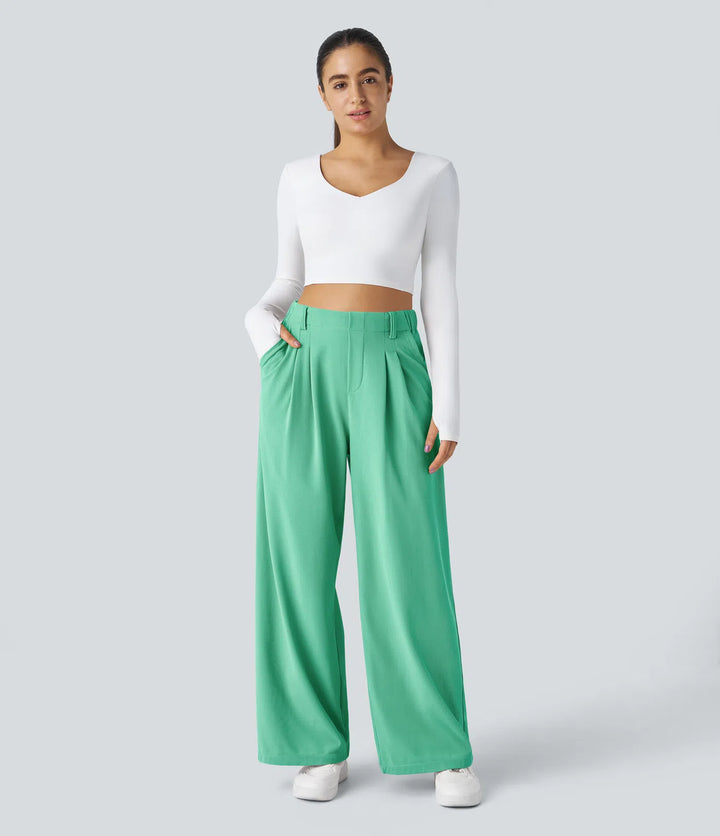 Pantalon fluide à taille haute et jambes larges, en tissu gaufré, avec poches latérales