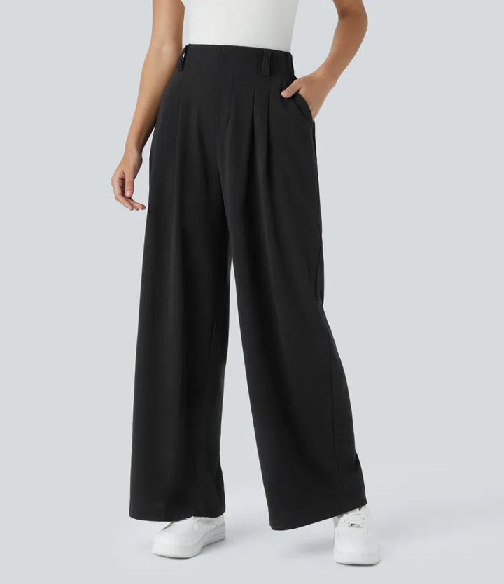 Pantalon fluide à taille haute et jambes larges, en tissu gaufré, avec poches latérales