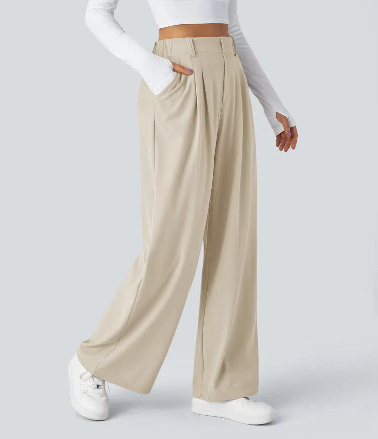 Pantalon fluide à taille haute et jambes larges, en tissu gaufré, avec poches latérales