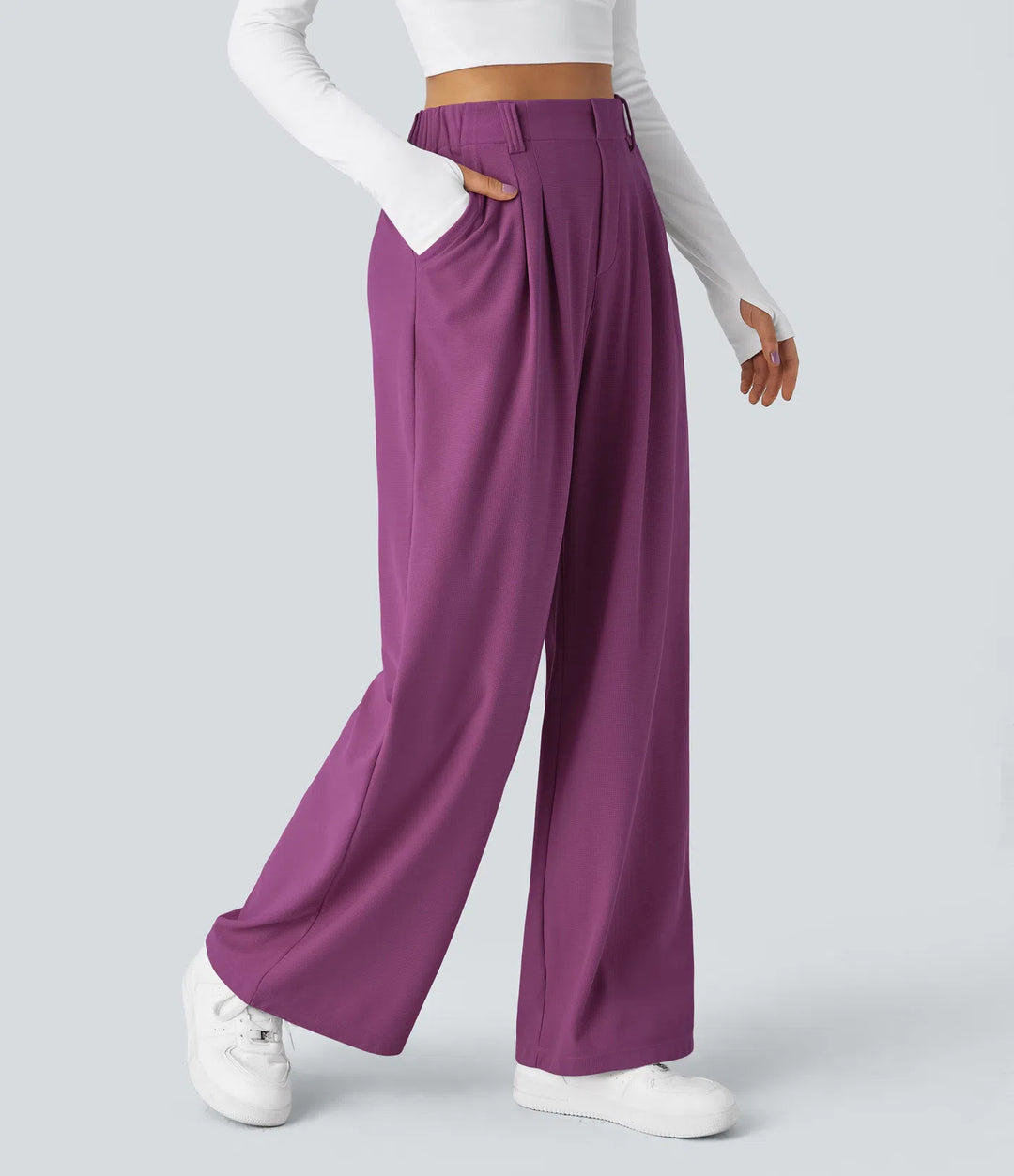 Pantalon fluide à taille haute et jambes larges, en tissu gaufré, avec poches latérales