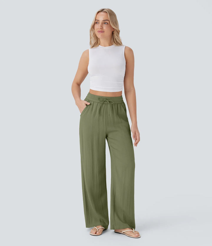 Pantalon large fluide taille haute avec cordon de serrage, poches latérales et aspect lin