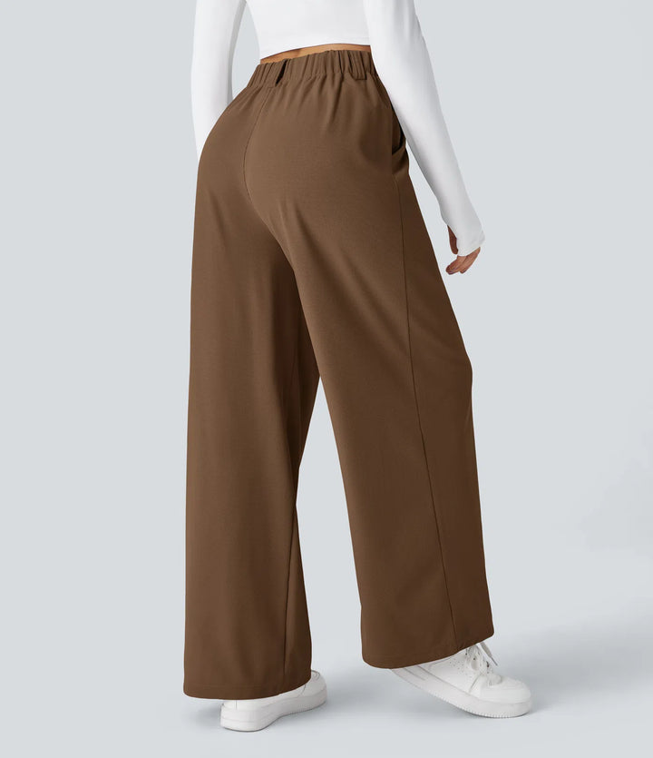 Pantalon fluide à taille haute et jambes larges, en tissu gaufré, avec poches latérales