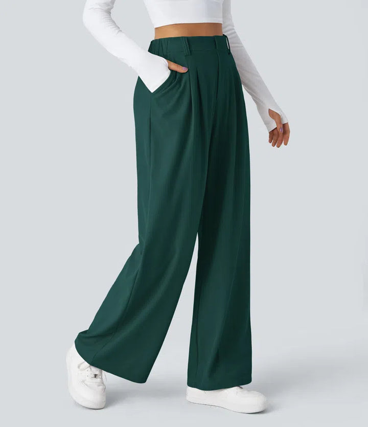 Pantalon fluide à taille haute et jambes larges, en tissu gaufré, avec poches latérales