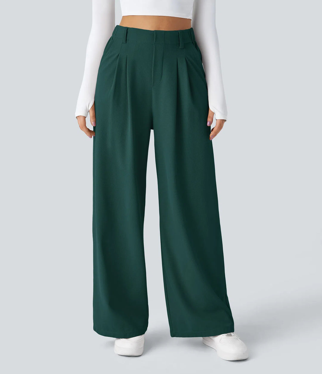 Pantalon fluide à taille haute et jambes larges, en tissu gaufré, avec poches latérales