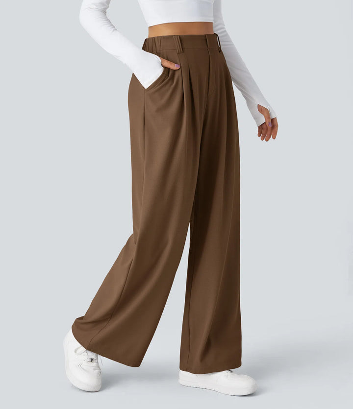 Pantalon fluide à taille haute et jambes larges, en tissu gaufré, avec poches latérales