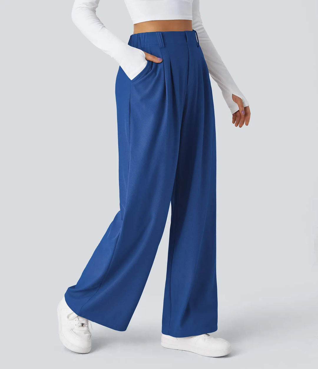 Pantalon fluide à taille haute et jambes larges, en tissu gaufré, avec poches latérales