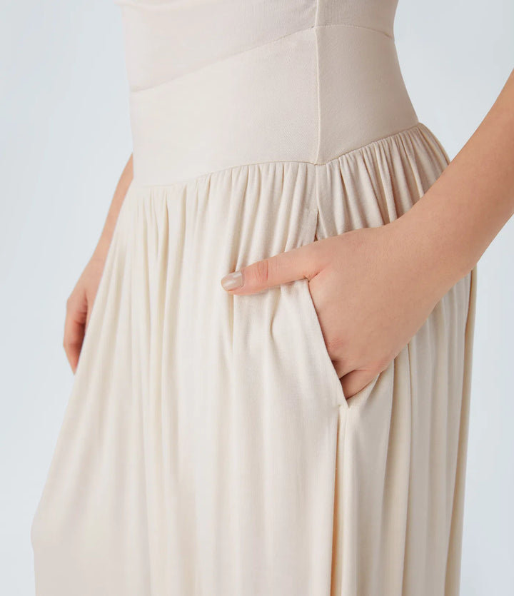 Robe longue décontractée à encolure bateau, bretelles asymétriques, côtés froncés et poches