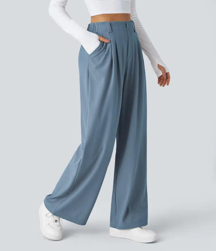 Pantalon fluide à taille haute et jambes larges, en tissu gaufré, avec poches latérales
