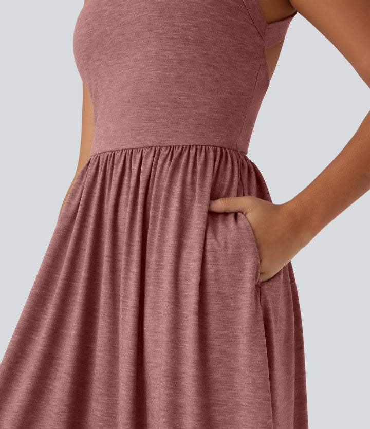 Robe longue fluide fendue avec poches latérales, dos nu et effet torsadé