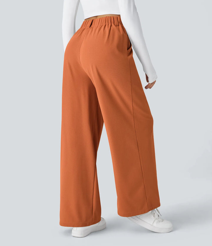 Pantalon fluide à taille haute et jambes larges, en tissu gaufré, avec poches latérales