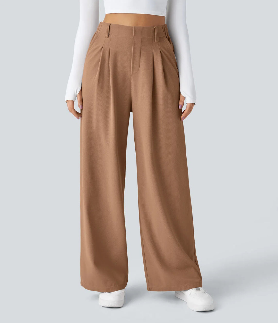 Pantalon fluide à taille haute et jambes larges, en tissu gaufré, avec poches latérales