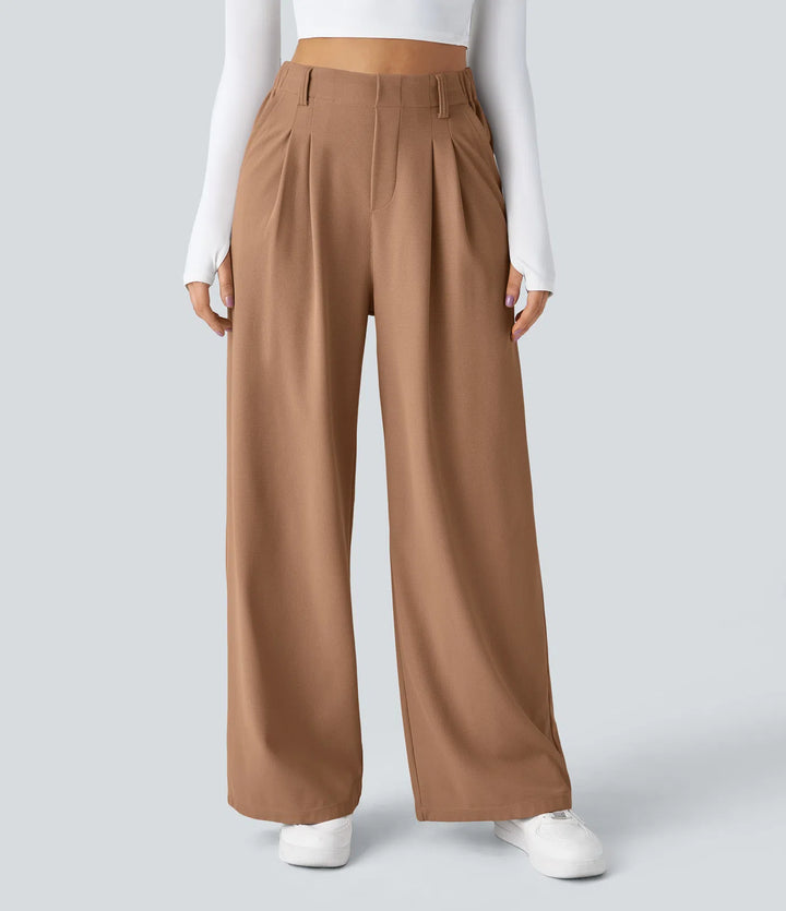 Pantalon fluide à taille haute et jambes larges, en tissu gaufré, avec poches latérales
