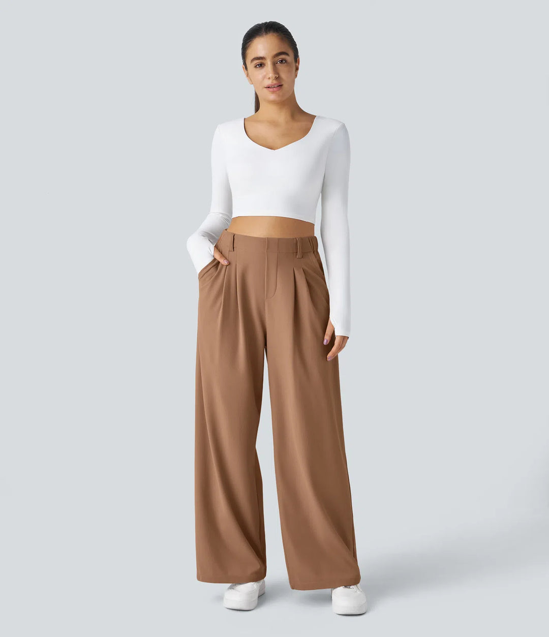Pantalon fluide à taille haute et jambes larges, en tissu gaufré, avec poches latérales
