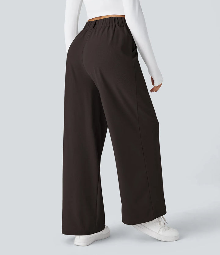 Pantalon fluide à taille haute et jambes larges, en tissu gaufré, avec poches latérales