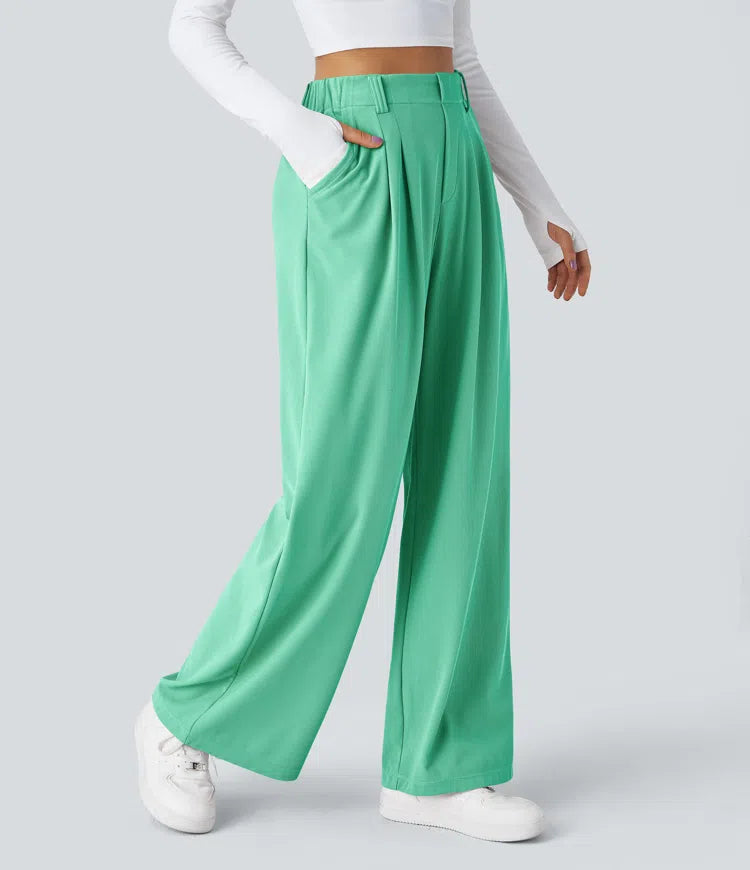 Pantalon fluide à taille haute et jambes larges, en tissu gaufré, avec poches latérales