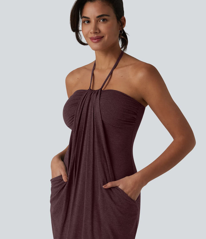 Robe resort mini dos nu à col licou avec lien noué dans le dos et poches