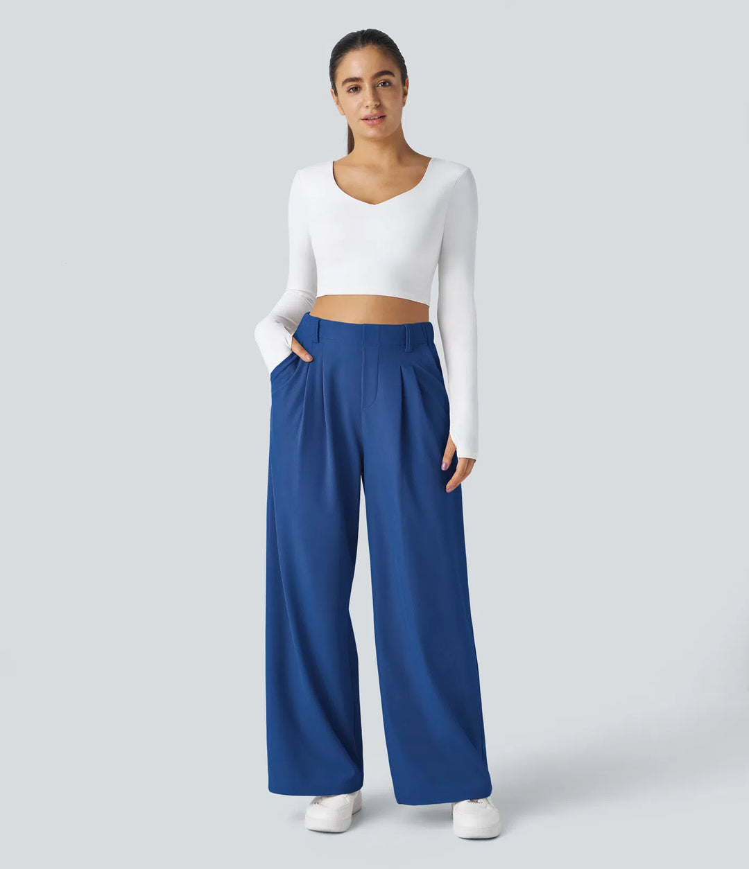Pantalon fluide à taille haute et jambes larges, en tissu gaufré, avec poches latérales