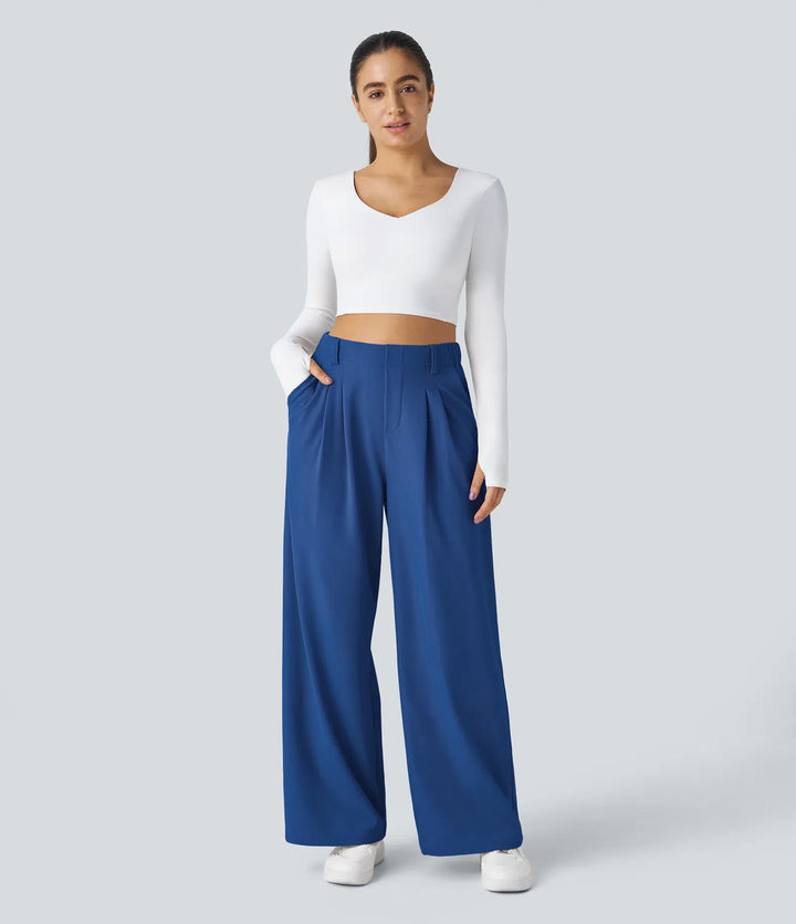 Pantalon fluide à taille haute et jambes larges, en tissu gaufré, avec poches latérales