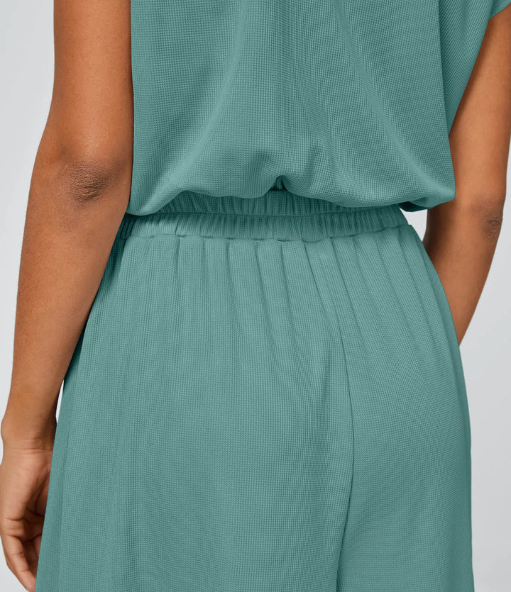 Combinaison Casual Col en V Jambes Large Plissée Manches Courtes Poche Latérale Gaufrée Fluide
