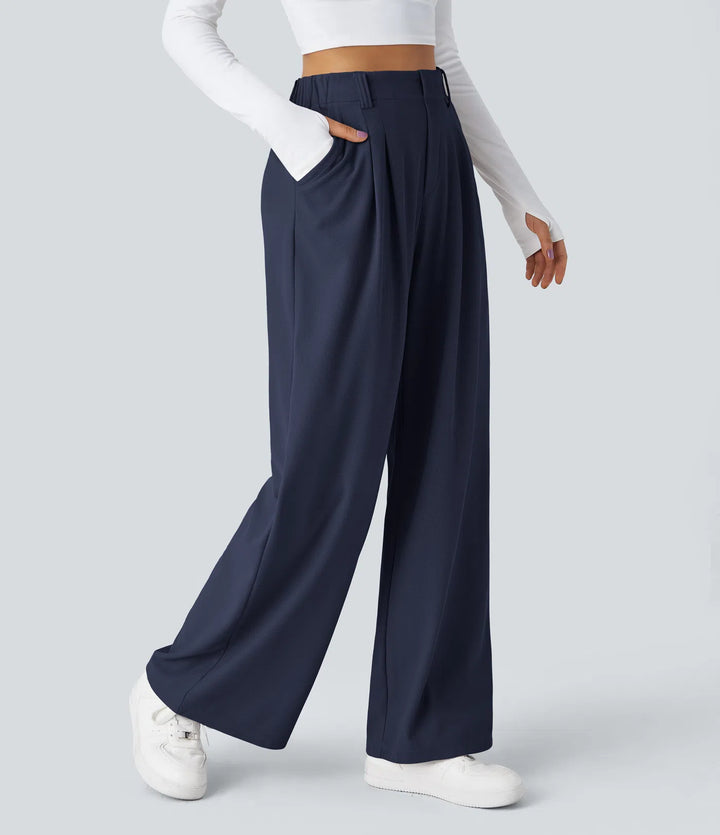 Pantalon fluide à taille haute et jambes larges, en tissu gaufré, avec poches latérales