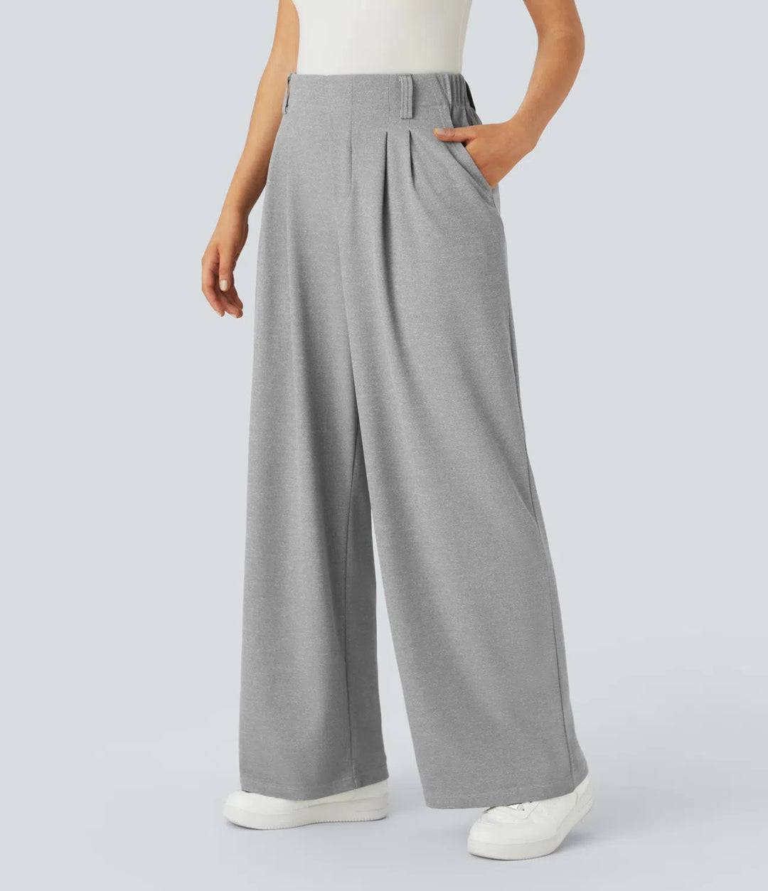 Pantalon fluide à taille haute et jambes larges, en tissu gaufré, avec poches latérales
