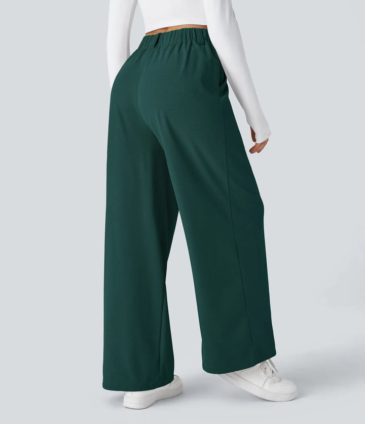 Pantalon fluide à taille haute et jambes larges, en tissu gaufré, avec poches latérales