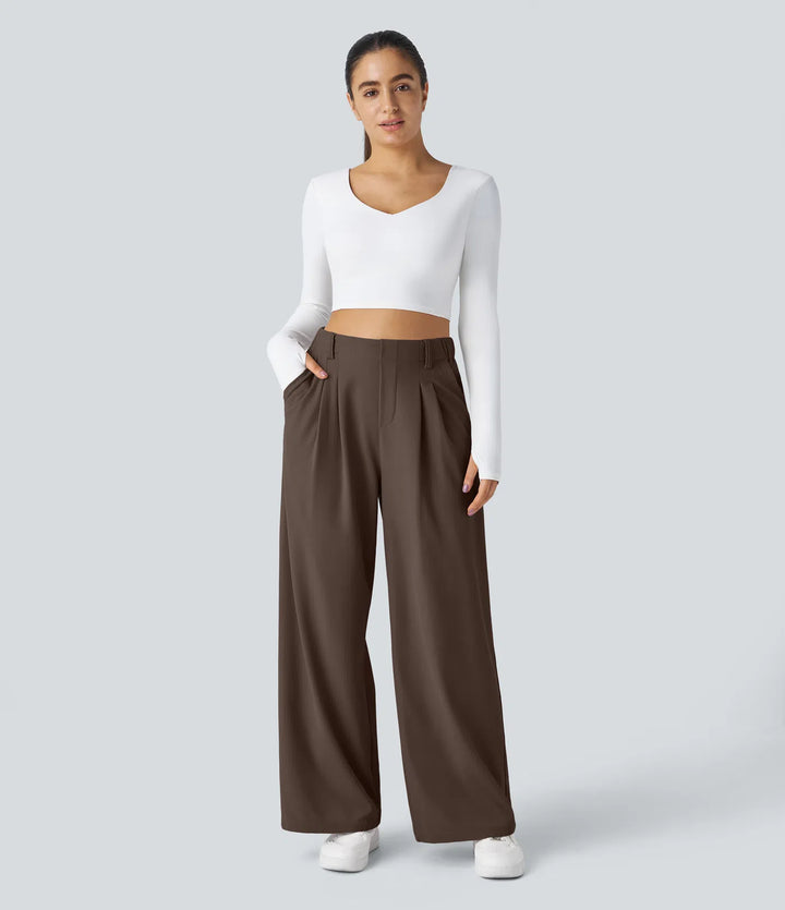 Pantalon fluide à taille haute et jambes larges, en tissu gaufré, avec poches latérales
