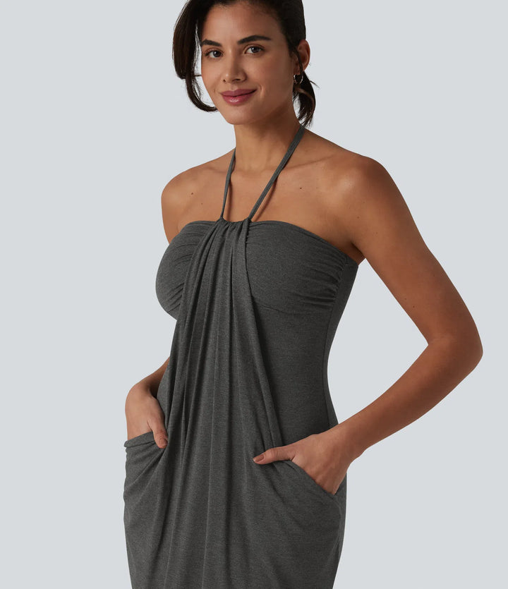 Robe resort mini dos nu à col licou avec lien noué dans le dos et poches