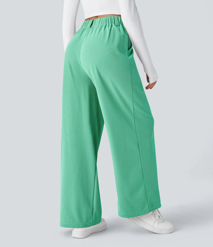 Pantalon fluide à taille haute et jambes larges, en tissu gaufré, avec poches latérales