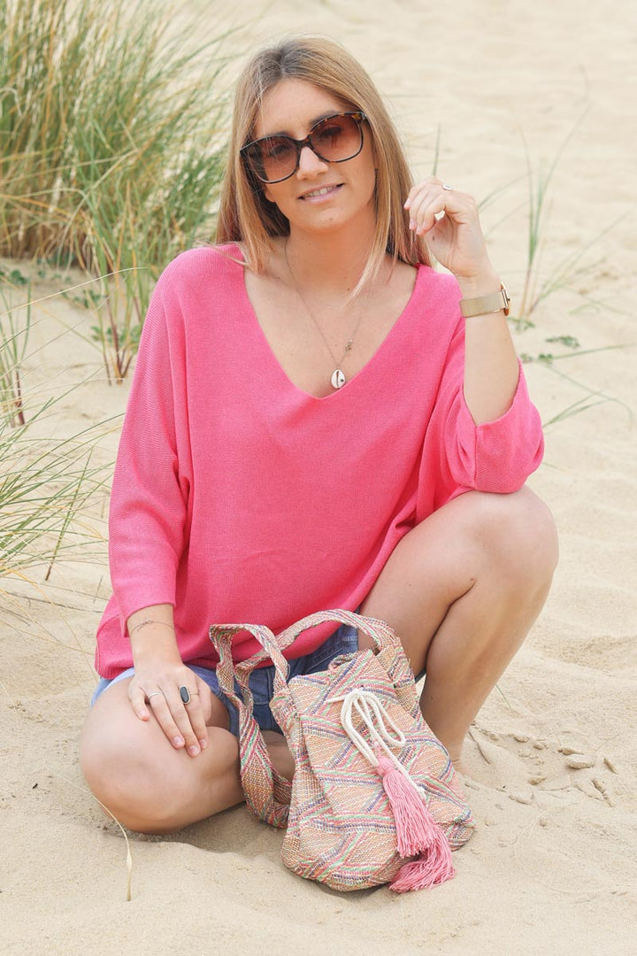 Top fushia jersey manches chauve souris