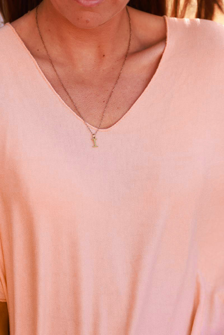 Top orange pastel fluide confort et stretch col v